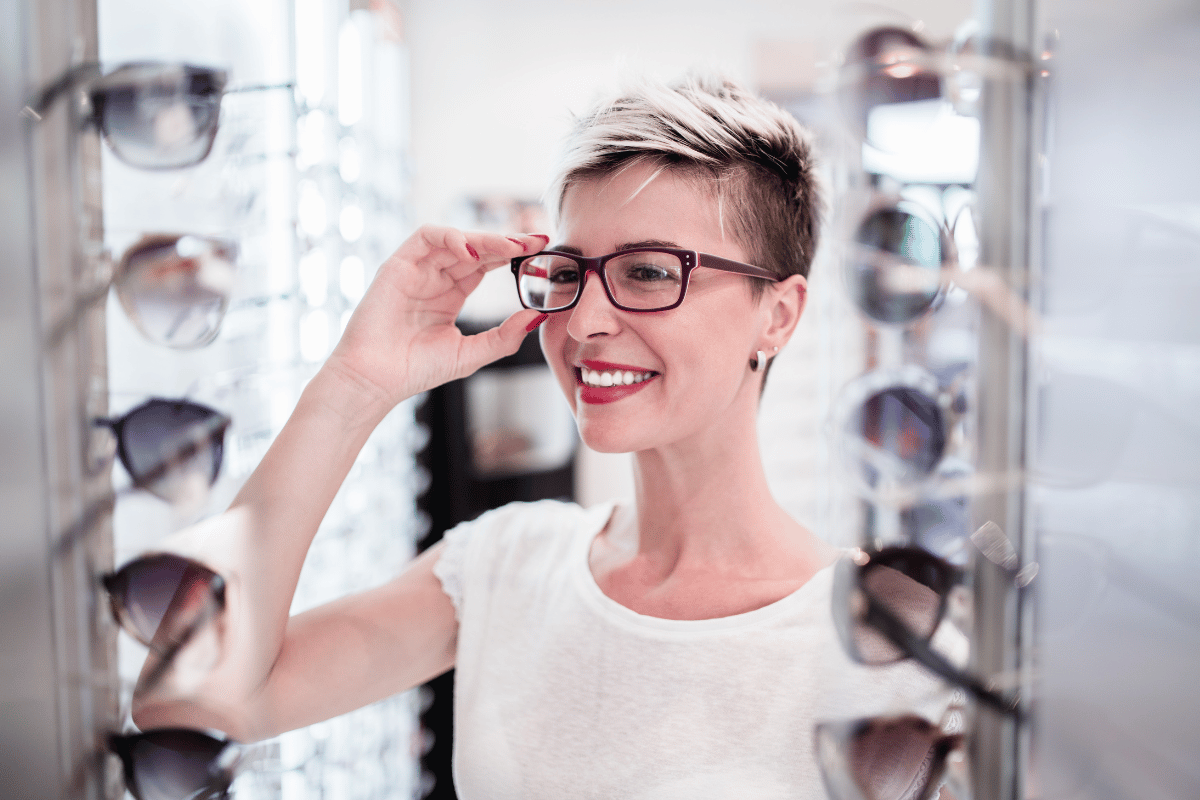 a woman shopping for eyewear in an optical
